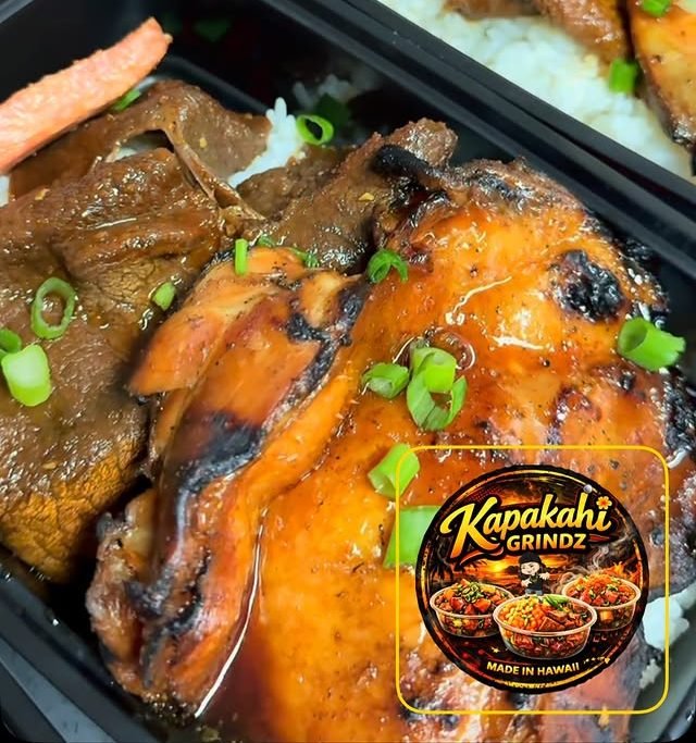 Smoked meat and huli-style plate lunch with rice, green onions and a Kapakahi Grindz sauce sticker